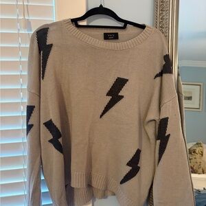 VICI Beige Knit Sweater with Black Lightning Bolt Pattern